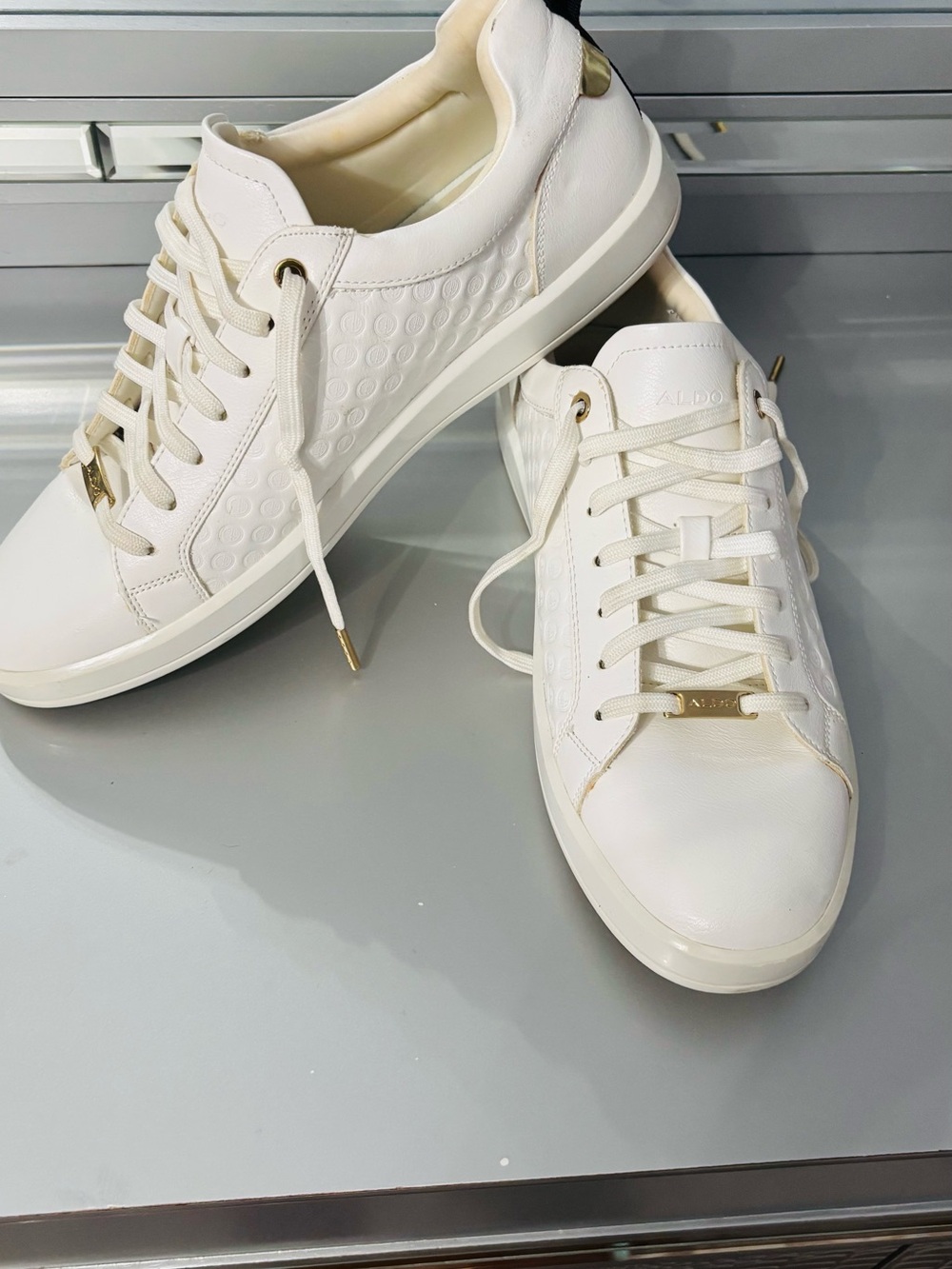 ALDO Off-White Leather Low-Top Sneakers with Gold Accents